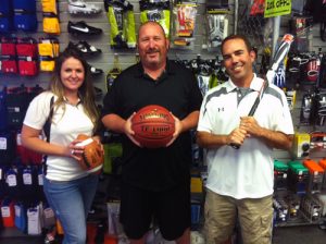 Your Sporting Goods Team: Arielle Dickens, Erik Johnson, and John Kennedy